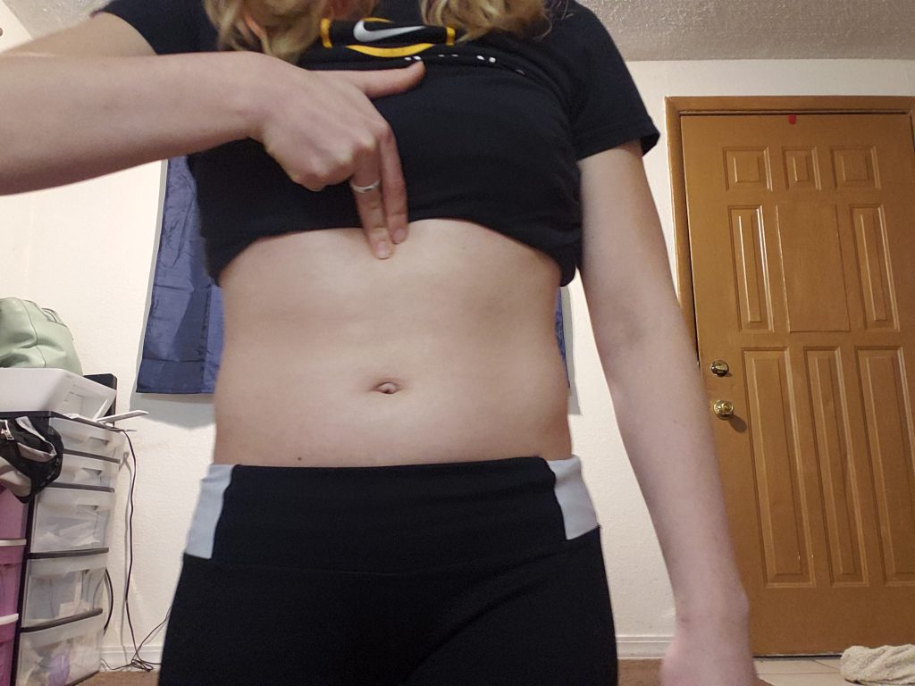 put your hand at your sternum in the middle of your tummy to test for diastasis recti