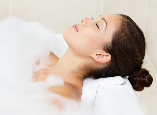 Woman relaxing in bath