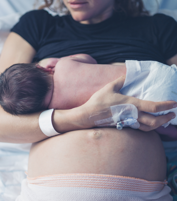 new mom breastfeeding baby