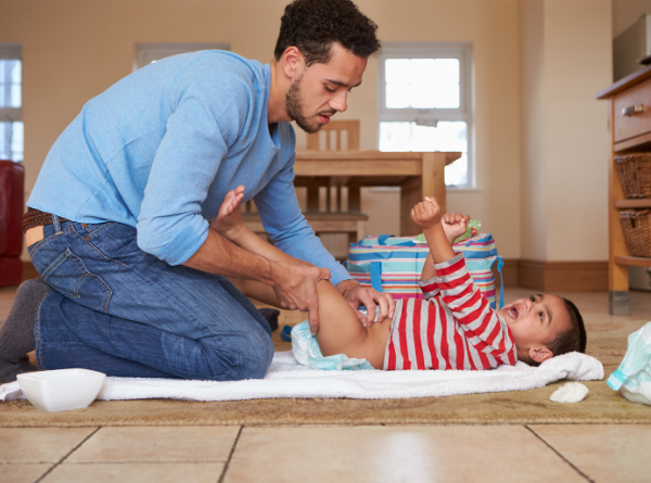 Man changing diaper