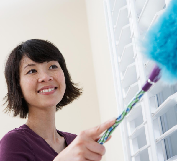 woman dusting