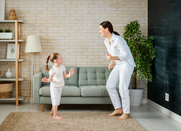 Mom and daughter dancing