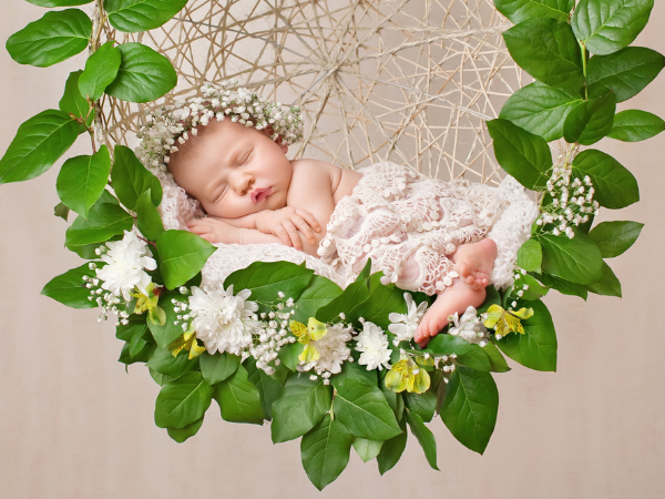 Newborn in fancy clothes