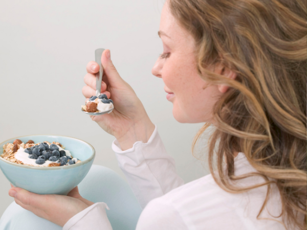 woman eating healthy after having a c-section